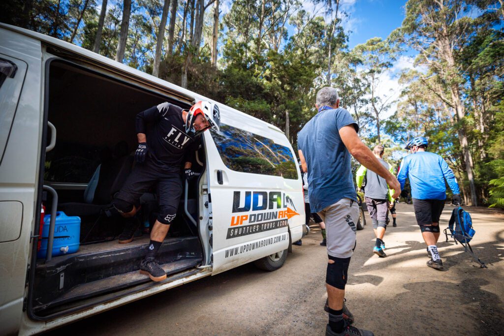 Mountain Bikers exiting UDA Shuttle Bus at Blue Derby Mountain Bike Trails